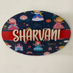 A custom nameplate for Sharvani with a lovely princess theme. The dark background makes the colorful illustrations and the wooden name stand out beautifully.