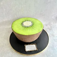 This was a fun and unusual request: a giant kiwi cake! We created this 5kg cake to look exactly like a sliced kiwi, and the team did an amazing job, especially with less than 24 hours' notice.
