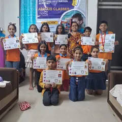 Proud winners of the 11th Open Abacus and Vedic Maths International Competition 2024 in Nashik! These students, holding their certificates and medals, are a testament to the power of dedication and expert training.