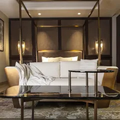 This four-poster bed and integrated sofa were custom-designed for the Barkat residence. The piece combines functions and creates a luxurious, hotel-like suite within the bedroom, showcasing our commitment to user-centric solutions.