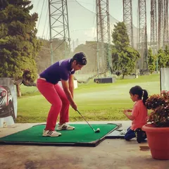 A candid moment with one of my youngest students. I believe in starting kids early and making the game a fun and positive experience from day one.