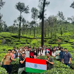 A large group celebrating Independence Day amidst the lush tea gardens of Chikmagalur. I can organize themed trips and special events for corporate teams and large private groups.