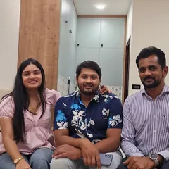 A happy moment with our clients in their new home. Seeing them settled and happy in a space we created together is the most rewarding part of our job.