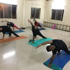 This is a dynamic arm strengthening sequence in one of my group classes. Poses like this build upper body strength in the shoulders and trapezius muscles, improving posture and endurance.
