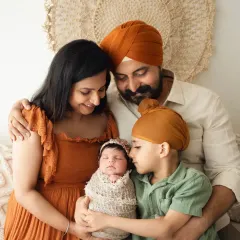 A heartwarming portrait of a family with their newborn and older son. My family photoshoots are designed to be relaxed and capture your natural connections.