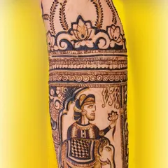 A close-up of a groom's portrait from a Rajasthani-themed bridal design. The artwork shows him seated on an elephant, holding a lotus, capturing the regal and romantic essence of the theme.