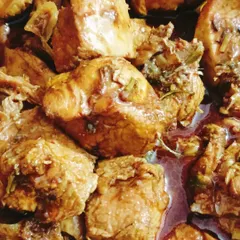 This is my saucy Naga-style pork curry, showing the rich texture of the gravy and meat. It's a simple, no-frills dish that focuses on authentic taste.