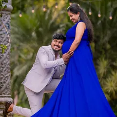 I love capturing the connection between partners during a maternity session. Here, the father-to-be listens to the baby bump, creating a sweet and emotional portrait that tells a story of shared excitement.