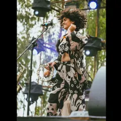 Modeling a stunning co-ord set from The Jodi Life during a live performance with my band. This shows how I can naturally showcase fashion in a high energy, authentic environment, connecting the brand with a live audience.