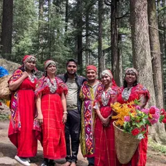 Our travelers trying on traditional Himachali outfits in Manali. It's a fun way to connect with the local culture and get some great photos.