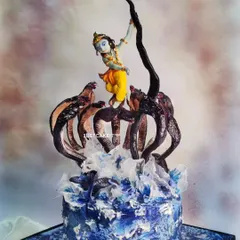 My award-winning 'Krishna dancing on Kaaliya Naag' cake is a piece of devotional art. The entire dynamic scene, including Krishna's pose and the splashing water of the Yamuna, is hand-molded and painted to capture a divine moment.