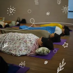 Surrender to the healing vibrations of a sound bath. Participants lie back and let the resonant frequencies of Tibetan bowls wash over them, promoting deep relaxation and mental clarity.