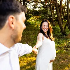 Leading the way into their next chapter together. This shot from an outdoor couple maternity session captures the excitement and partnership of the journey ahead.