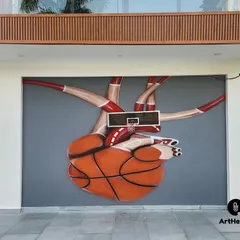A creative and interactive mural where a basketball hoop is integrated into an anatomical heart made of a basketball. This unique piece at a home in Palam Vihar is a true conversation starter.