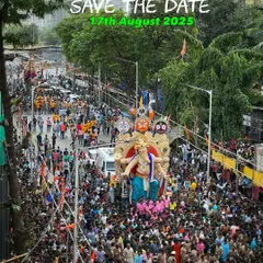 An aerial view of the Chinchpoklicha Chintamani Aagman, showcasing the massive crowd that gathers to welcome the idol. This high-angle shot is perfect for showing the density of the procession.