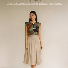 My art is created to be lived in, not just looked at. This top features a print from one of my original paintings, turning a simple silhouette into a piece of wearable art. It's a unique way to celebrate individuality in corporate apparel or personal gifting.