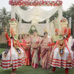 A traditional welcome for the bride's family, complete with Kathakali dancers. I love incorporating local culture to make destination weddings even more special.