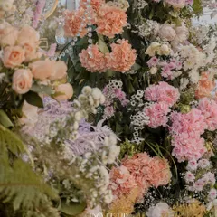 A close-up of the dense and textural floral arrangements from the Udaipur wedding. The mix of hydrangeas, roses, and other blooms in soft pastel shades creates a breathtakingly lush effect.
