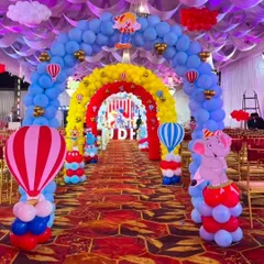 We make a grand first impression with spectacular entrance decorations. Here is a multi-layered balloon archway we designed for a circus and carnival themed birthday, complete with hot air balloon sculptures and character cutouts to welcome the little guests.