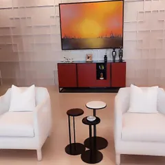 Here, a pair of pristine white armchairs creates a balanced and inviting seating arrangement. Their modern form provides a beautiful contrast to the textured wall and bold color of the console, showcasing how our pieces can complete a contemporary art-filled interior.