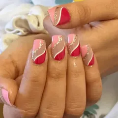 A creative and artistic design using shades of pink and red. I used negative space and wavy lines of gold glitter to create a modern and eye-catching pattern.
