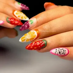 Who wants a fruit salad? I had so much fun with this detailed, hand-painted 3D fruit art on sharp almond-shaped extensions. Each nail is a different fruit, from juicy strawberries and oranges to dragon fruit and grapes.