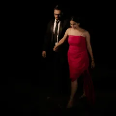 Another moment from the same pre-wedding shoot, capturing a candid, walking shot. The styling was kept minimal and elegant to let the couple's connection be the focus of the photograph.