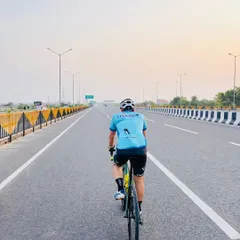 Riding into the sunrise on an open expressway. There's a unique peace and freedom in these early morning rides before the city wakes up.