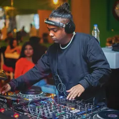 Just your girlfriend's favourite DJ, doing what I do best. Keeping the vibe smooth and the crowd moving.