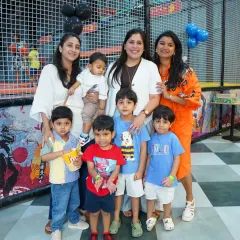 A wonderful group photo of moms and their kids enjoying a playdate together. Wobble World is a great place for community and connection.
