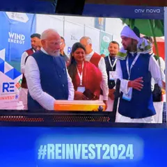 Another view of our founder explaining the features of the Smart Solar Hut to Honorable Prime Minister Shri Narendra Modi. His engagement and questions about our project's employment impact were deeply motivating.