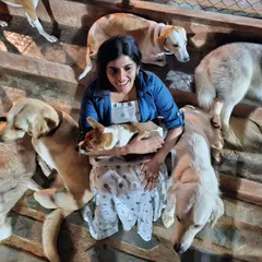 Surrounded by a sea of happy dogs! This is my happy place, and I love it when visitors feel the same joy of being completely accepted by the pack.