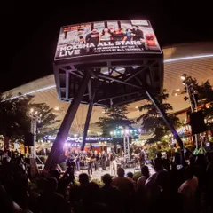 There's nothing like playing a huge outdoor stage. This wide shot shows the Moksha All Stars live at The Quad, with a massive screen and an amazing crowd, proving we can handle large-scale festival events.