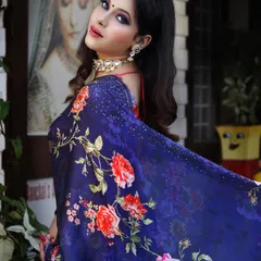 A modern glam look for a saree. I paired this beautiful floral print with a sultry smokey eye and a neutral glossy lip to create a balanced and elegant style perfect for an evening reception or cocktail party.