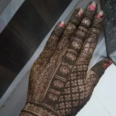 This is a student's practice piece with the henna paste still on. Learning how to fill patterns cleanly and create consistent textures is a core part of my curriculum.