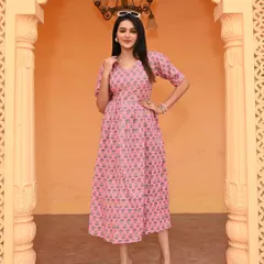 My traditional Bagru hand-block printed cotton dress in a lovely pink. This one-piece dress features charming puff sleeves and is made from breathable 60*60 pure cotton, ensuring both comfort and style.