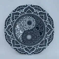 Find balance and serenity with our handmade wooden Yin Yang mandala. This spiritual wall decor features multiple layers of intricate patterns, creating a beautiful play of shadow and light that adds a peaceful, harmonious touch to your home.