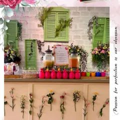 A charming and rustic floral bar setup for a Haldi ceremony at Della Resorts, Lonavala. The design incorporates natural elements, fresh flowers, and vibrant colors to create a cheerful and welcoming vibe.