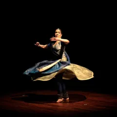 A moment of pure grace and motion from "Immersed." The performance combines traditional Kathak with modern choreography and stage design.