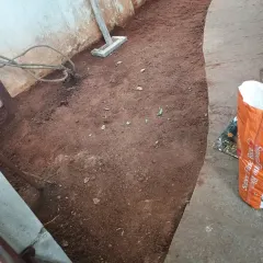 This image shows a cleared and ready dirt area before the base layer is added. I ensure all roots and rocks are removed.