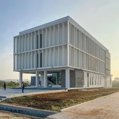 The Amaron SDC Boys Hostel in Chittoor is a 20,000 sqft project that prioritizes functionality and the well being of its residents. The design, with its deep-set windows and vertical fins, is driven by the need for thermal comfort and natural ventilation.