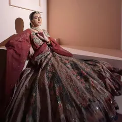 An artistic, full-length shot of our multi-color floral lehenga. The dramatic flare of the skirt makes for breathtaking photos.