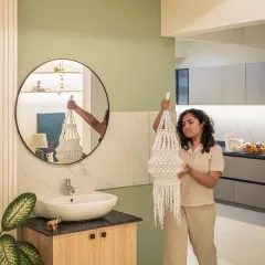 Here you can see how the wash area transitions into the kitchen. We were stubborn about not letting this be a dead space. The pastel green wall, round mirror, and light wood cabinet create a buffer zone that is subtle but not silent, bold but still harmonious with the rest of the home.