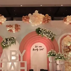 We can bearly wait! This grand baby shower stage for Baby Shah features our signature organic balloon clouds in a sophisticated earthy palette, custom 3D lettering, and elegant arched backdrops. It's a warm, inviting, and luxurious setup to celebrate the parents to be.