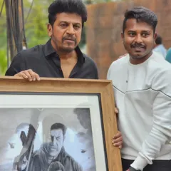 Another shot with Shivarajkumar and the 'Ghost' portrait. It's an honor to have my work recognized by the people who inspire it.