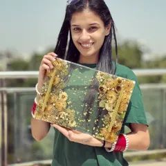 An aesthetic and functional varmala preservation. This 9x12 inch tray with golden handles is made from a couple's wedding flowers. It's perfect for serving guests or as a beautiful decorative piece on your coffee table.