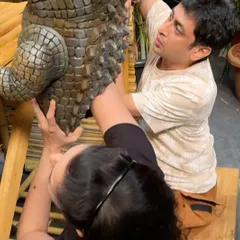 My wife Rujuta and I setting up the crocodile puppet on set. Operating these complex puppets often requires multiple puppeteers working in sync to create fluid, natural movements.
