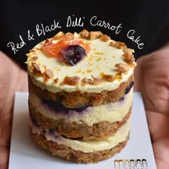 Our Red & Black Dilli Carrot Cake, a winter special that returns to our menu each year. It features layers of red carrot cake, black carrot halwa, and whipped cream cheese frosting, showcasing the best of seasonal Indian produce.