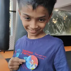 Another one of our star boys showing his reward after a productive day on the mats. These small achievements build a strong sense of accomplishment for our young martial artists.