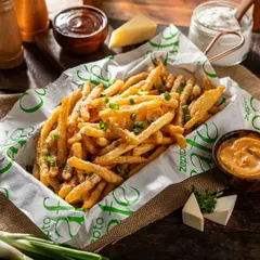 Golden-brown french fries for Zepto Cafe, perfectly seasoned and ready to order. We style comfort food to look its best, ensuring it appears fresh and crispy for customers browsing online.